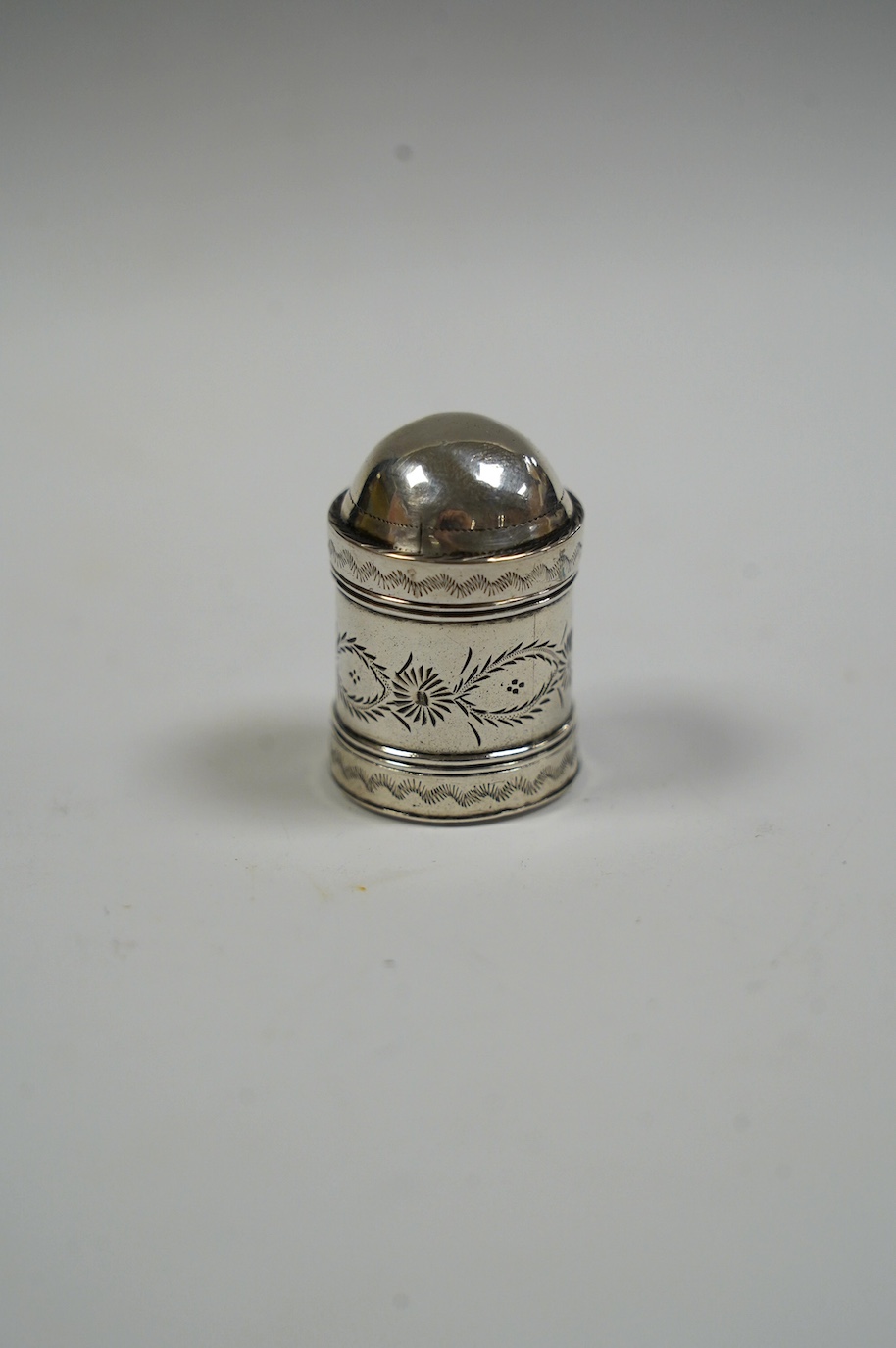 A George III engraved silver dome topped nutmeg grater, by Samuel Pemberton, Birmingham, 1796, 32mm. Condition - fair